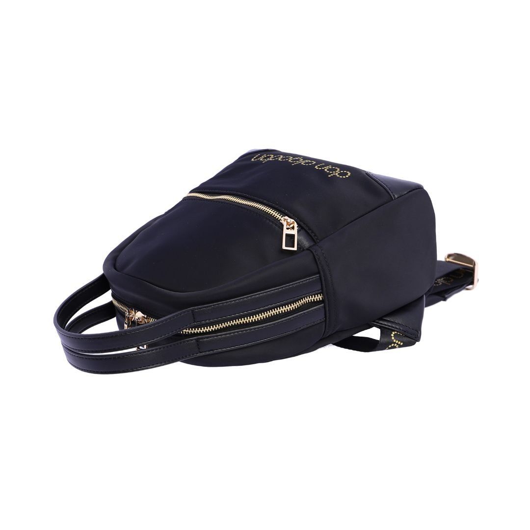 Mochila de tela negra de Don Algodon tumbada